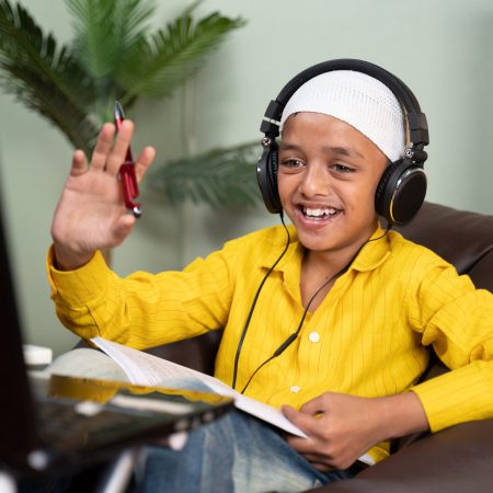 Muslim,Kid,Busy,On,Online,Class,By,Making,Video,Call