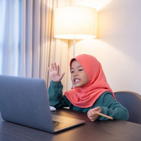 Asian,Muslim,Elementary,Student,Greet,Her,Friend,And,Teacher,During